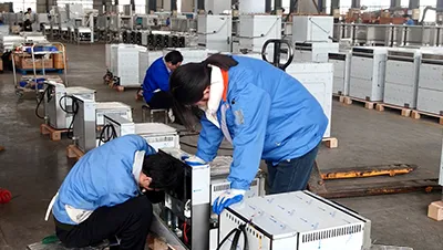 Technicians Conduct Inspection of Gas Range Units